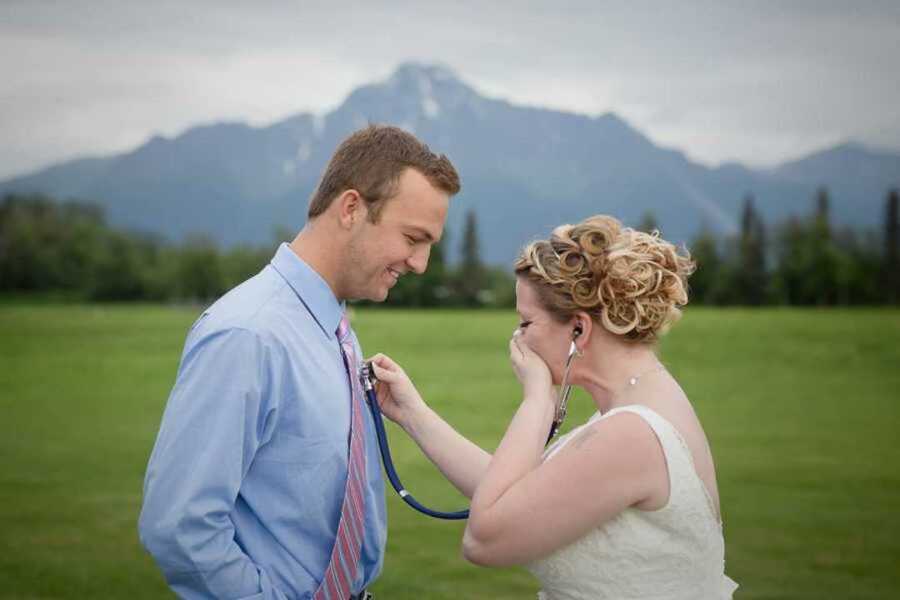 bride listening to late son's heart in organ recipient