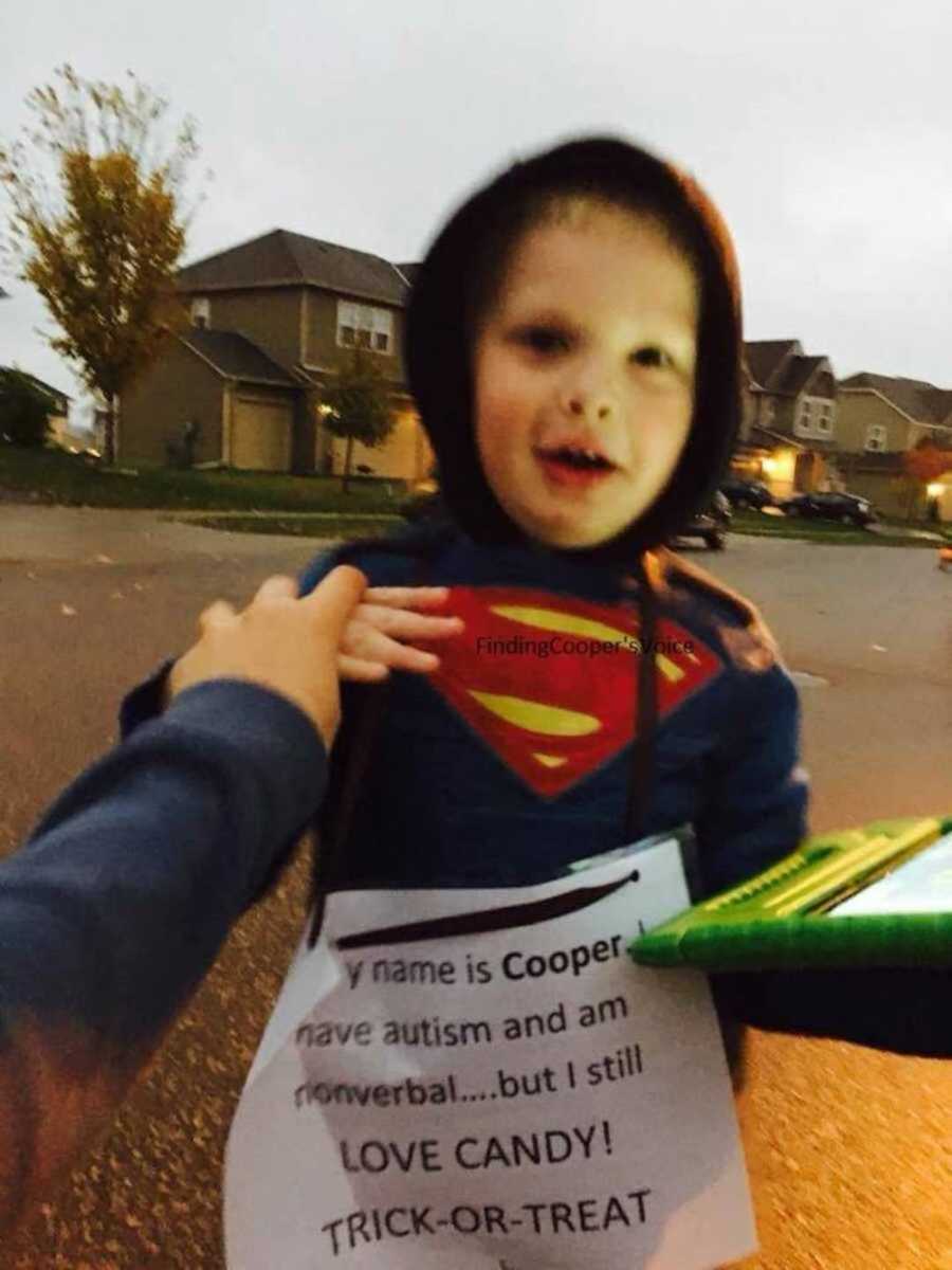 boy with autism in superman costume at Halloween