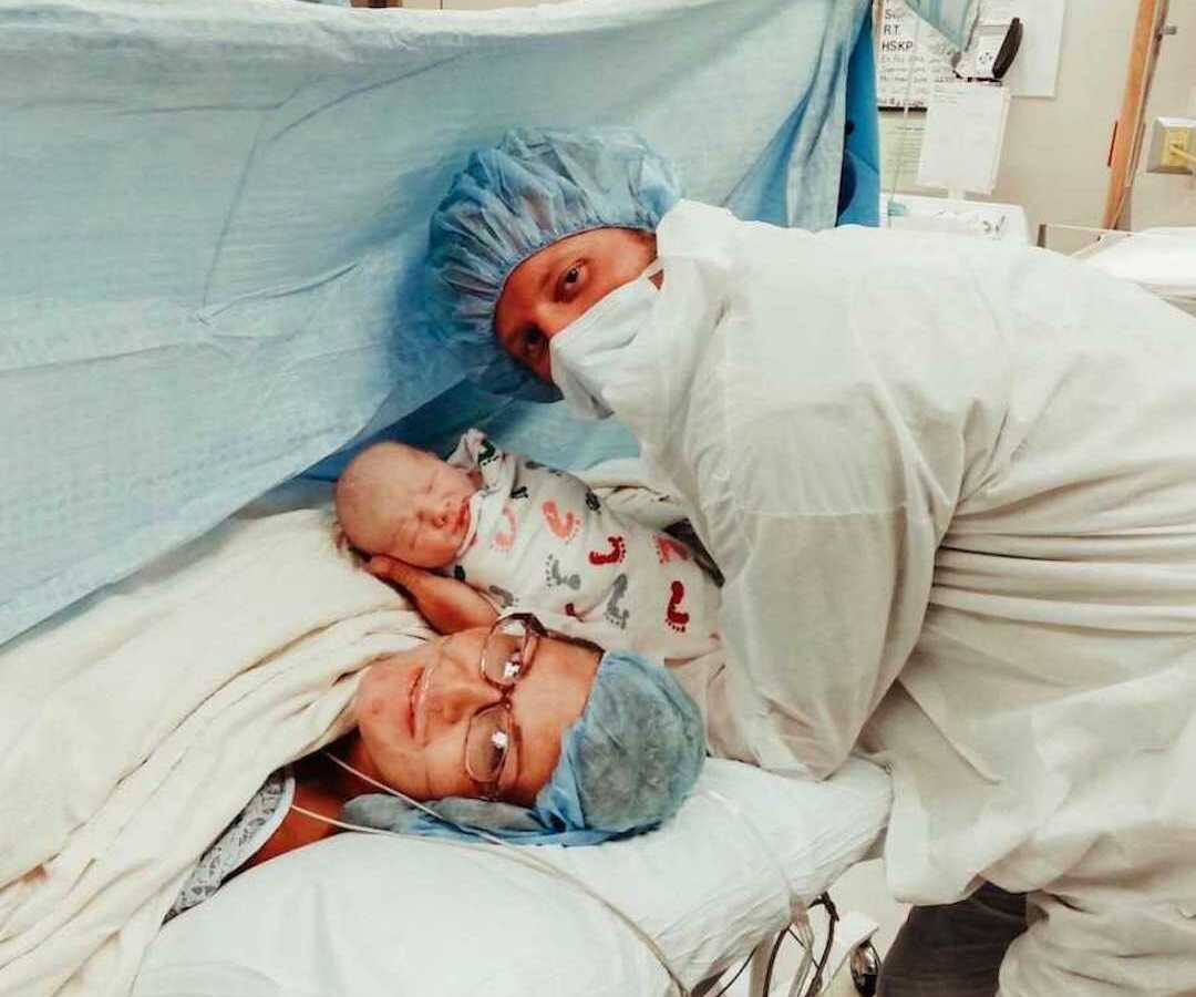 mom, baby, and doctor immediately after birth