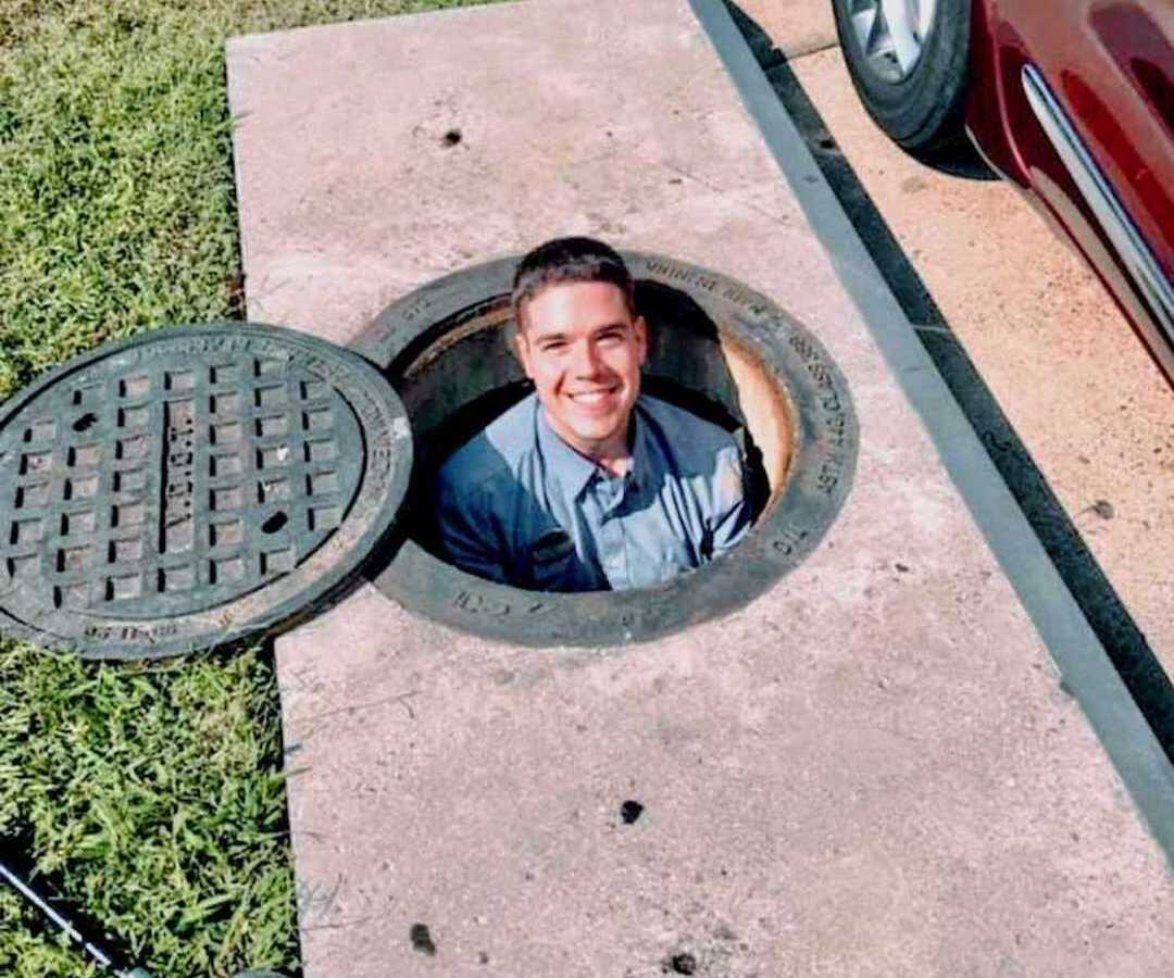 chic fil a employee in manhole