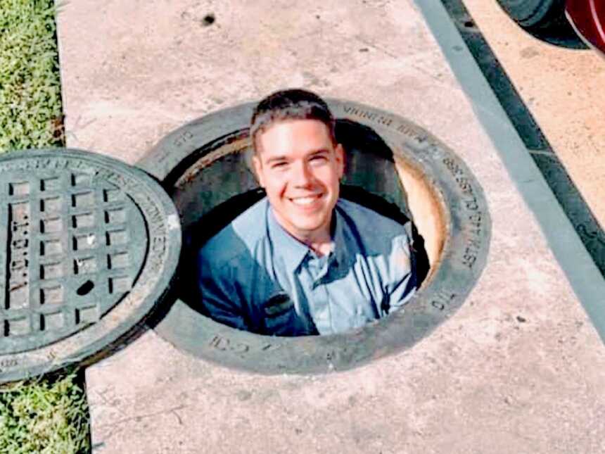 chic-fil-a employee in manhole
