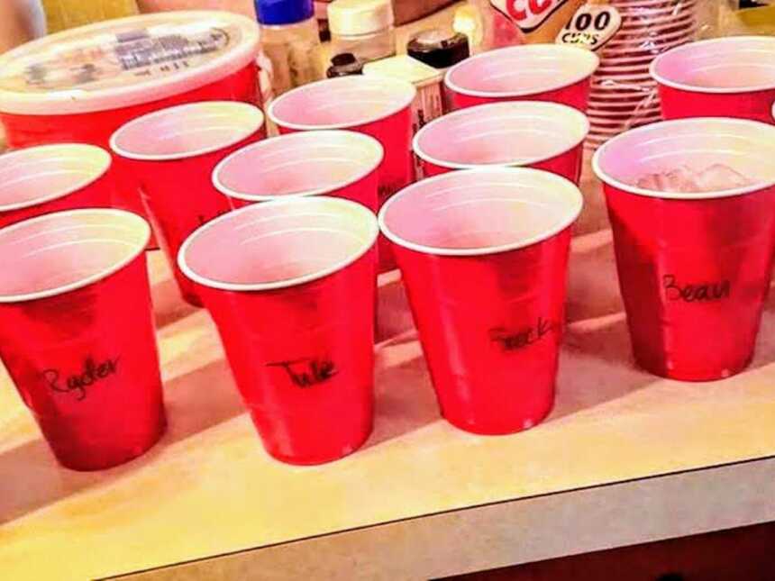 red solo cups labeled with names