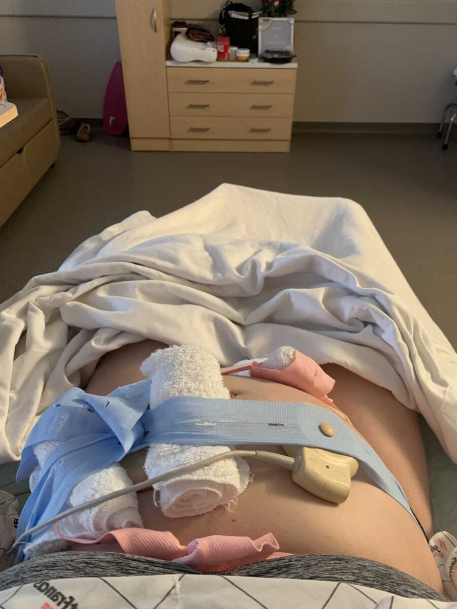 Pregnant woman on bed red in hospital