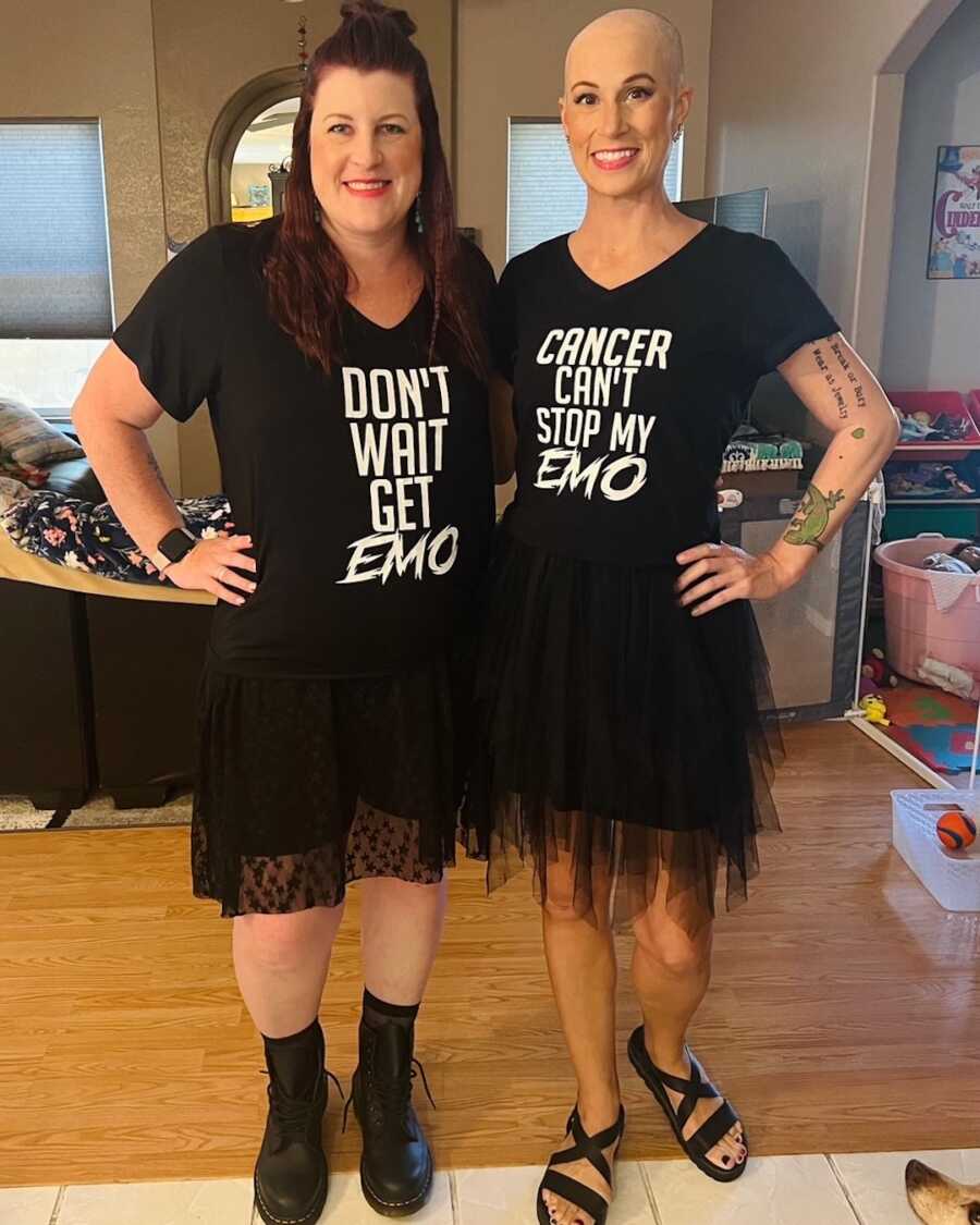 Cancer patient and friend wearing match black t-shirts