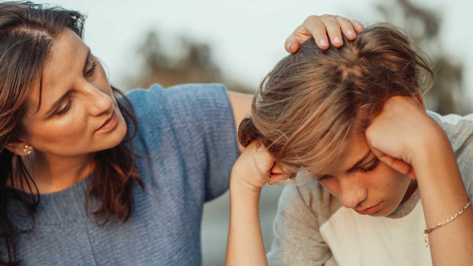 mom comforting son stressed about back to school season